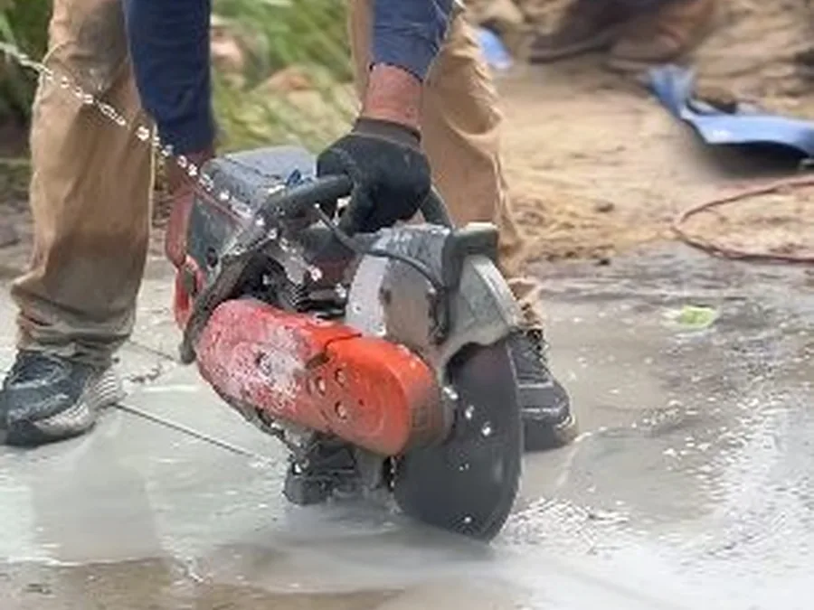 concrete slab opening and marked pipe route during leak repair shown as secondary detail for Plumber in Covina, CA