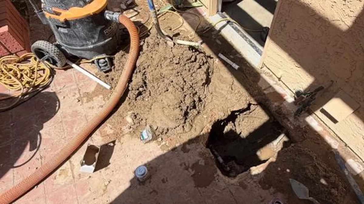 concrete slab opening and marked pipe route during leak repair shown as hero overview for Plumber in Covina, CA