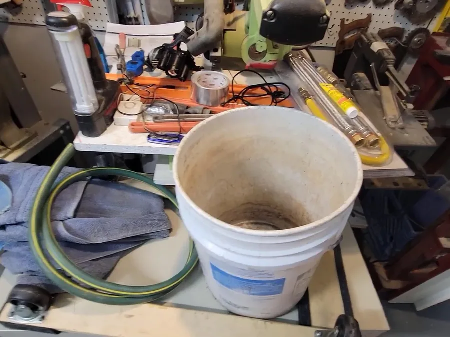 drain cleaning equipment working near a sink or pipe opening shown as secondary detail for Plumber in Downtown Glendora, CA