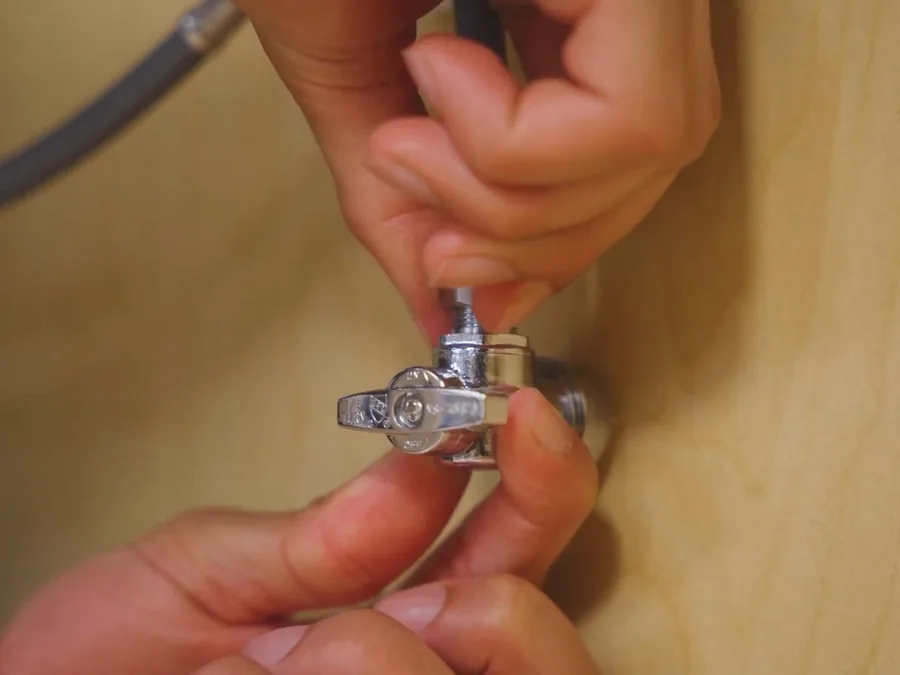 sink faucet or under-cabinet supply connection being serviced shown as secondary detail for Plumber in Duarte, CA