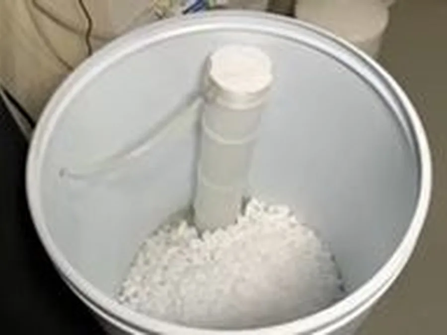 water softener control valve, resin tank, or brine tank being serviced shown as main detail for Glendora's Hard Water Explained: 150-220 ppm and What It Does to Your Pipes and Water Heater