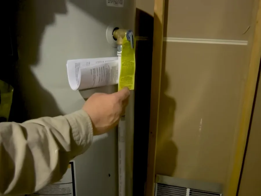 tank water heater piping and service components being inspected shown as secondary detail for Glendora's Hard Water Explained: 150-220 ppm and What It Does to Your Pipes and Water Heater