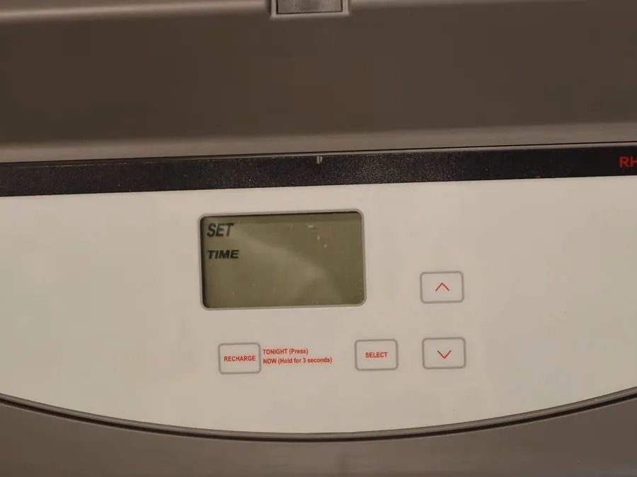 water softener control valve, resin tank, or brine tank being serviced shown as secondary detail for Is a Water Softener Worth It in Glendora? Costs, Benefits, and the City vs Suburban Water Question