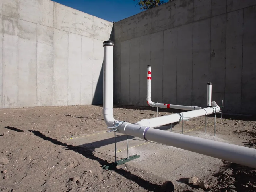 concrete slab opening and marked pipe route during leak repair shown as secondary detail for Plumber in Monrovia, CA
