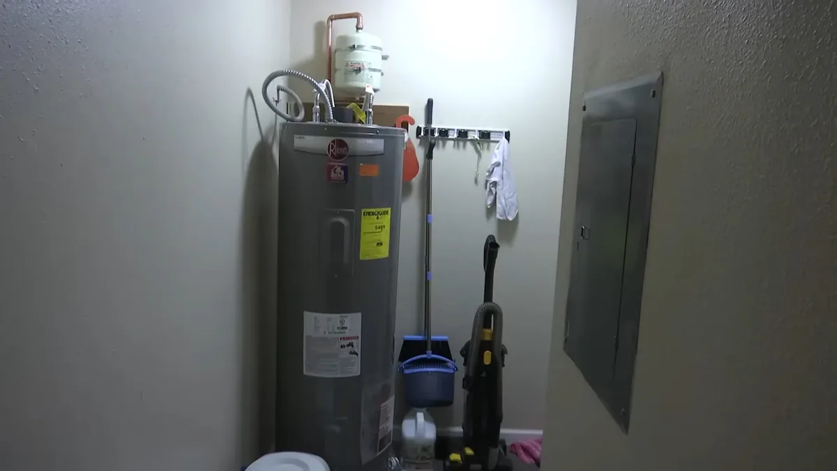tank water heater piping and service components being inspected shown as hero overview for Water Heater Installation & Replacement in Glendora, CA
