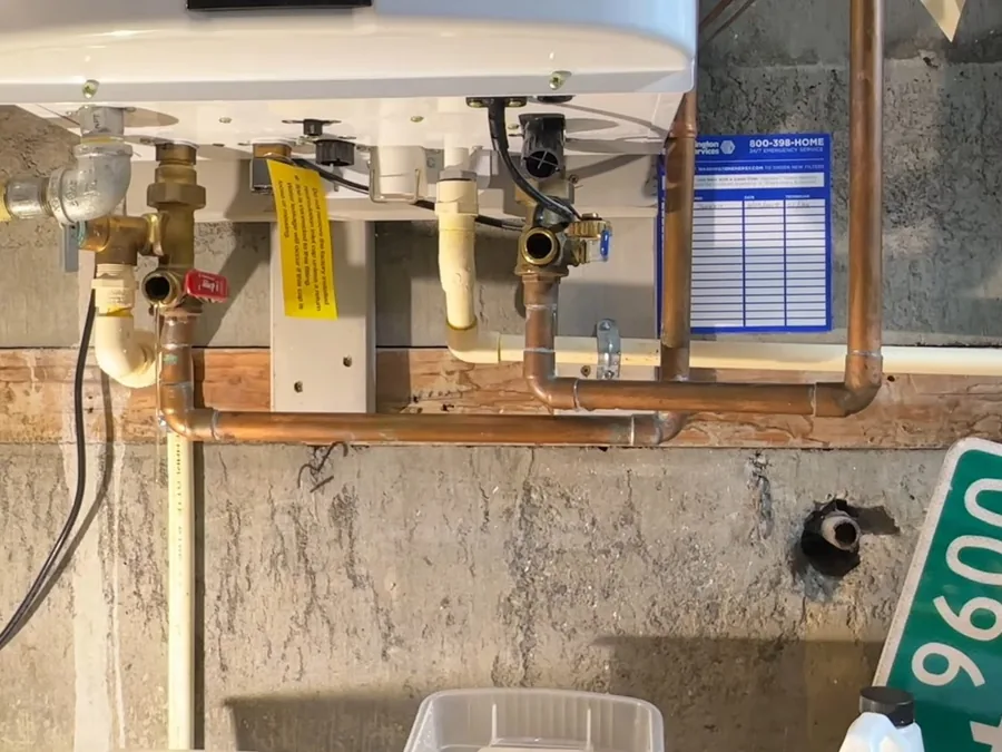tankless water heater piping and service valves during maintenance shown as secondary detail for Water Heater Installation & Replacement in Glendora, CA