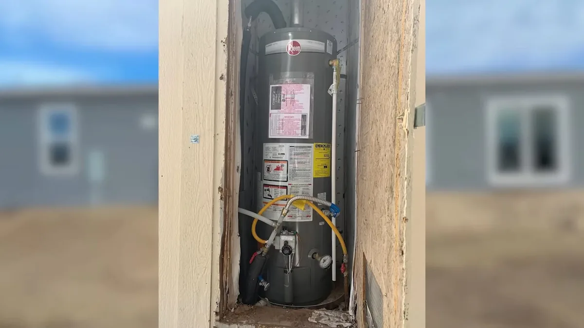 tank water heater piping and service components being inspected shown as hero overview for Water Heater Repair in Glendora, CA